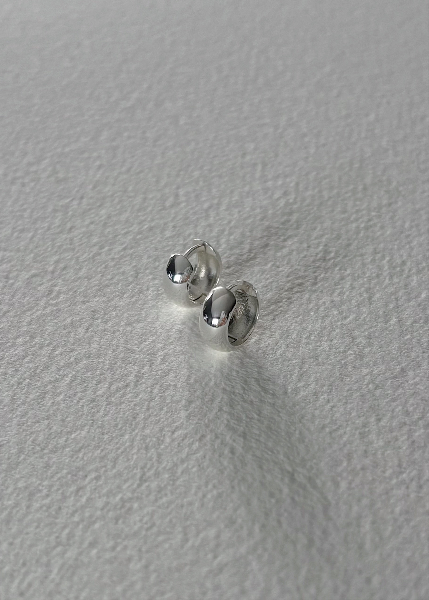 Mini silver huggies