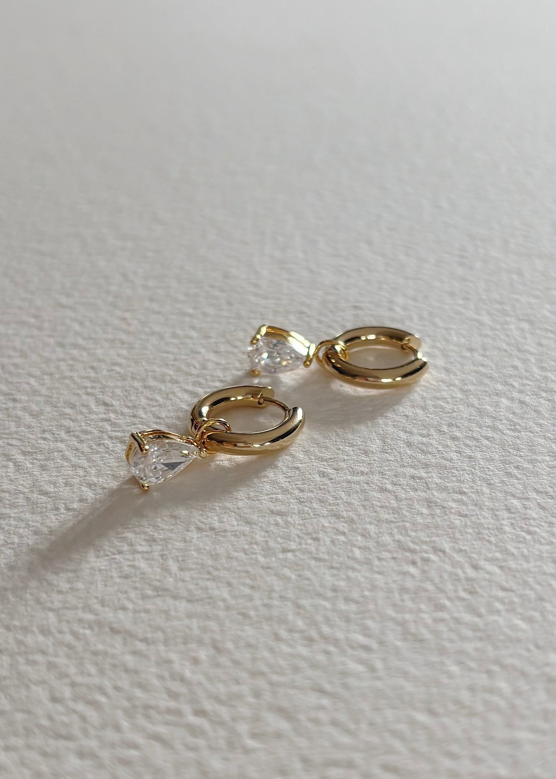 Gold hoops earrings with natural semi-precious stones, designed for timeless everyday elegance.